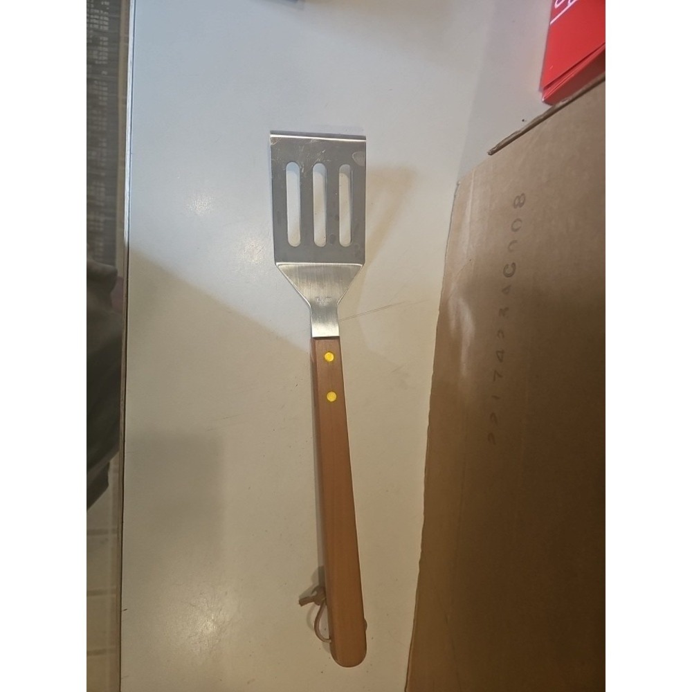 Stainless Steel Wood Slotted Turner (Spatula)   Used  2 Scuffs